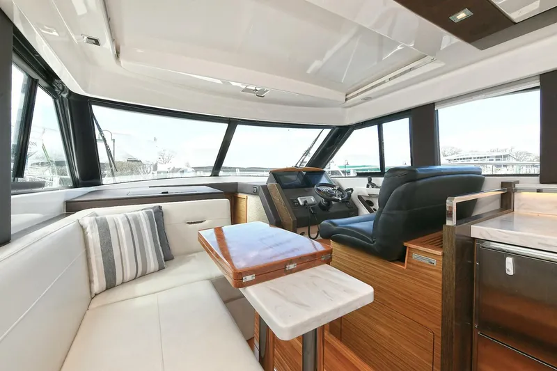 Slide: The Image of Interior of 2018 Tiara Yachts 39 Coupe, featuring luxurious seating and modern design. - 22