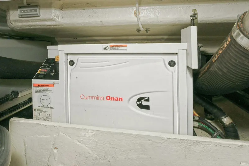 Slide: The Image of Cummins Onan generator in 2018 Tiara Yachts 39 Coupe engine room. - 45