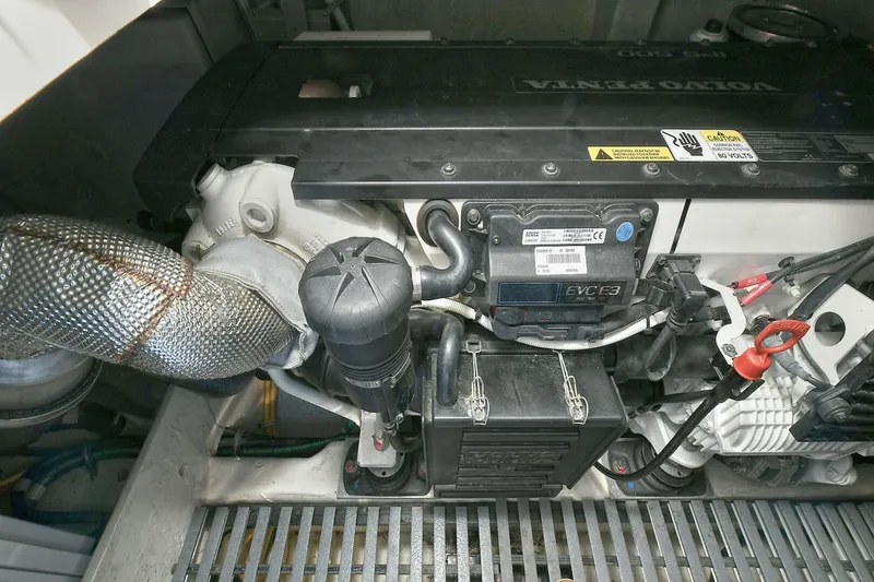 Slide: The Image of Engine compartment of a 2018 Tiara Yachts 39 Coupe, featuring a Volvo Penta engine. - 46