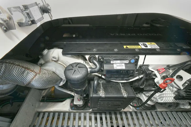 Slide: The Image of Engine compartment of a 2018 Tiara Yachts 39 Coupe, featuring Volvo Penta components. - 47