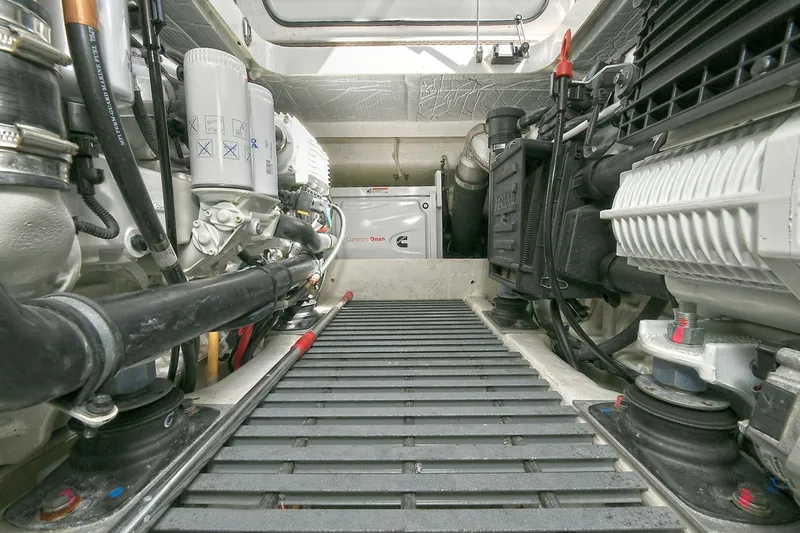 Slide: The Image of Engine room of 2018 Tiara Yachts 39 Coupe, showcasing mechanical components and systems. - 48