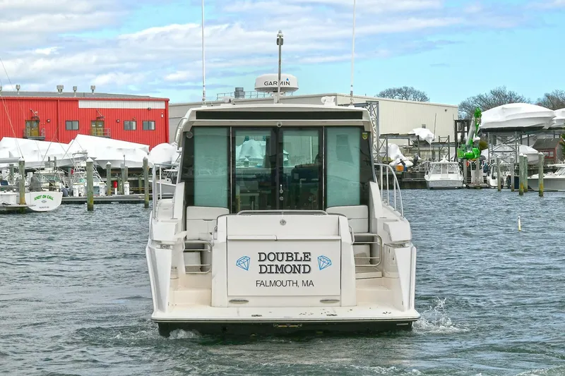 Slide: The Image of 2018 Tiara Yachts 39 Coupe, "Double Dimond," docked in Falmouth, MA marina. - 7