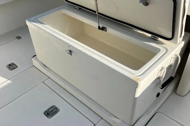 Slide: The Image of Open storage compartment on 2018 SeaVee 320B boat deck. - 18