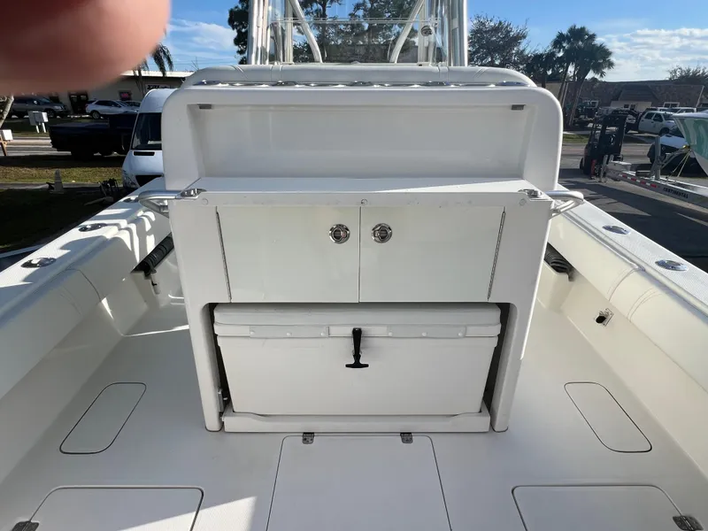 Slide: The Image of 2018 SeaVee 320B boat interior with storage and cooler. - 8