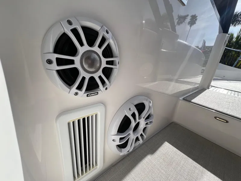 Slide: The Image of 2023 Regal 36 XO boat speakers and vent detail, showcasing modern audio features. - 31