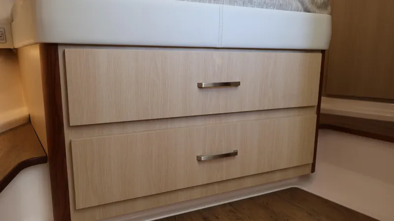 Slide: The Image of 2023 Regal 36 XO interior with wooden drawers and modern handles. - 39