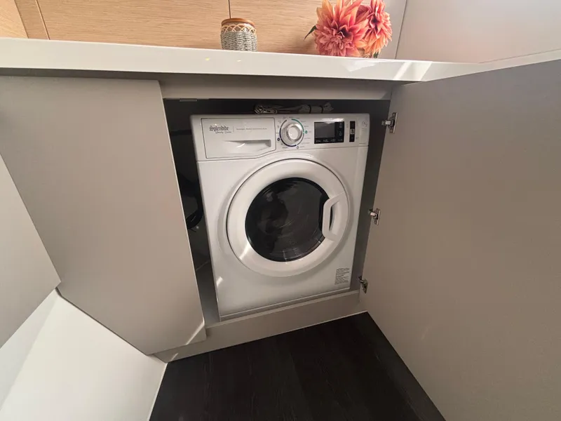 Slide: The Image of Built-in washing machine on Fountaine Pajot Astrea 42 yacht, 2025 model. - 12