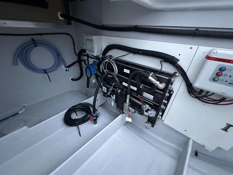 Slide: The Image of Electrical system inside 2025 Fountaine Pajot Astrea 42 yacht, showcasing wiring and components. - 35
