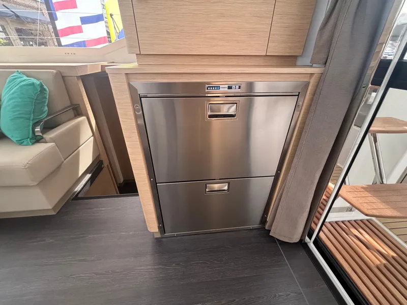 Slide: The Image of Modern kitchen area on 2025 Fountaine Pajot Astrea 42 yacht with stainless steel appliances. - 13