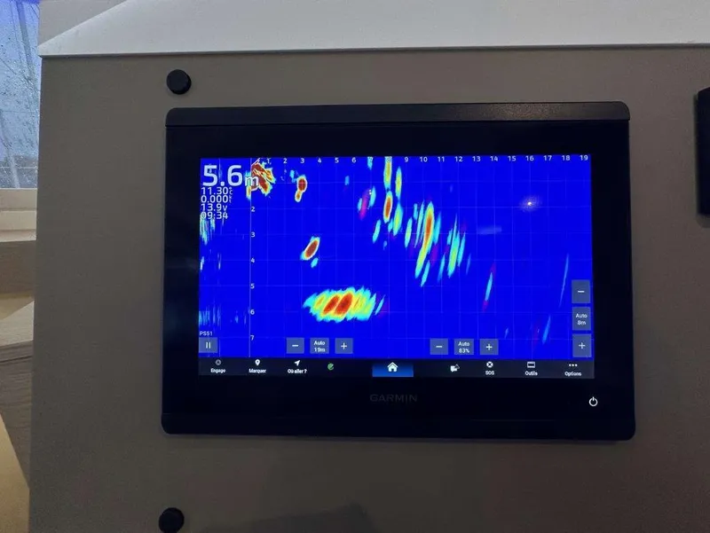 Slide: The Image of Sonar display on 2025 Fountaine Pajot Astrea 42, showing underwater activity. - 30