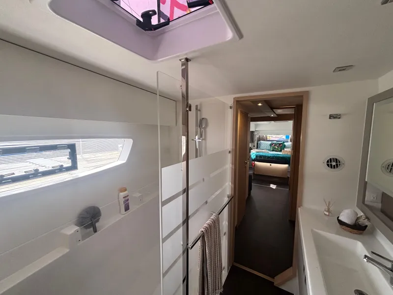 Slide: The Image of Luxurious bathroom interior of 2025 Fountaine Pajot Astrea 42 catamaran. - 34