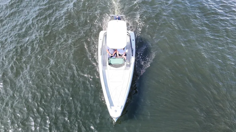 Slide: The Image of 2022 Saxdor SX200 boat cruising on open water, aerial view. - 3