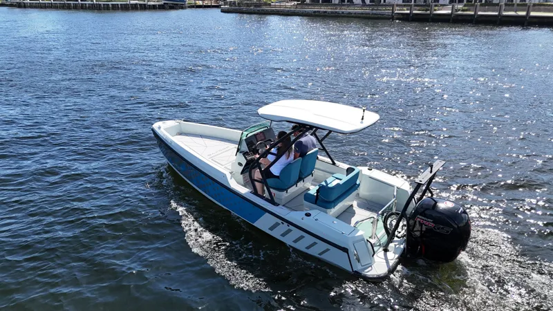 Slide: The Image of 2022 Saxdor SX200 boat cruising on a sunny day in open water. - 4