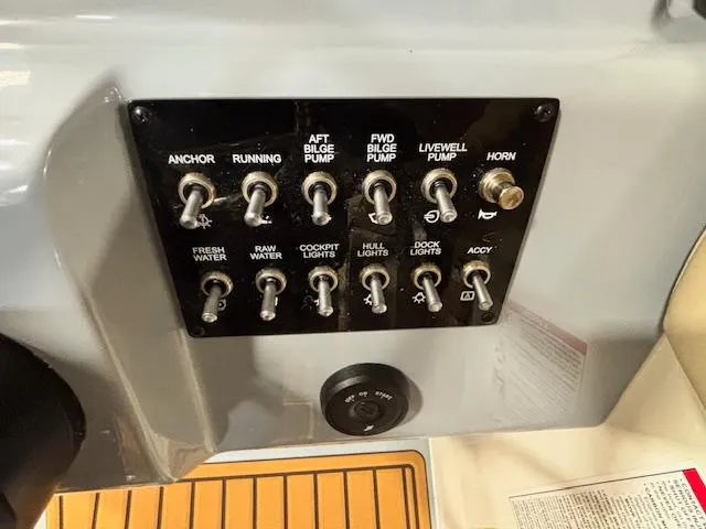 Slide: The Image of Control panel of 2025 Bayliner T22 SC boat with various switches and functions. - 19