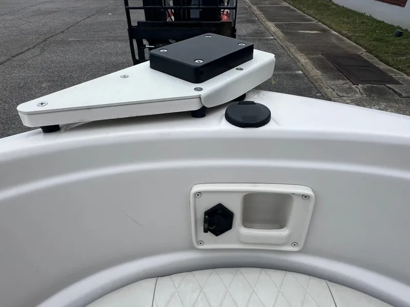 Slide: The Image of 2016 Tahoe 450 TF boat detail showing deck fittings and hardware. - 15