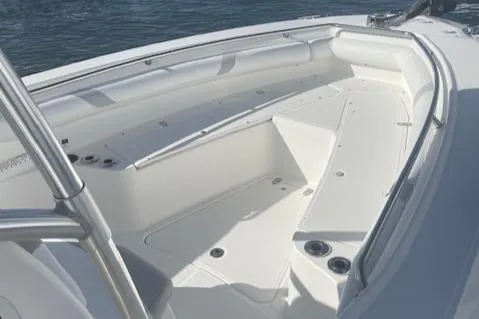 Slide: The Image of 2008 Boston Whaler 270 Outrage boat interior with spacious seating and sleek design. - 16