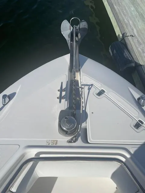Slide: The Image of 2008 Boston Whaler 270 Outrage boat anchor and bow detail at dock. - 17