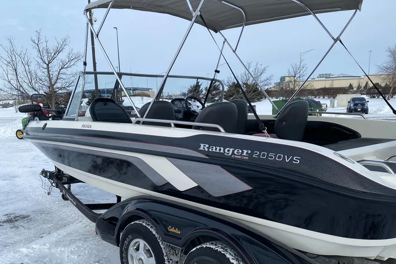 Slide: The Image of 2008 Ranger 2050VS boat with canopy on snowy ground. - 3