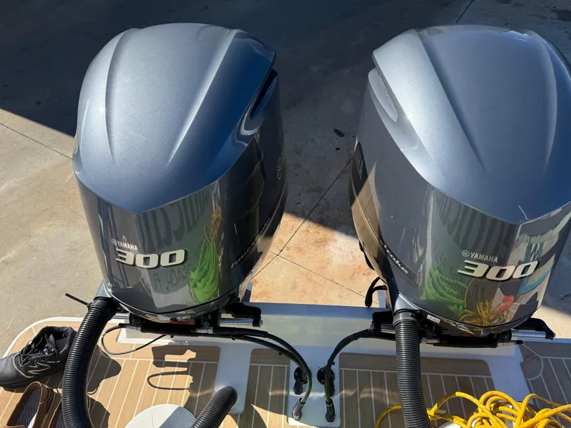 Slide: The Image of Twin Yamaha 300 outboard engines on a 2019 Regulator 31 boat. - 12