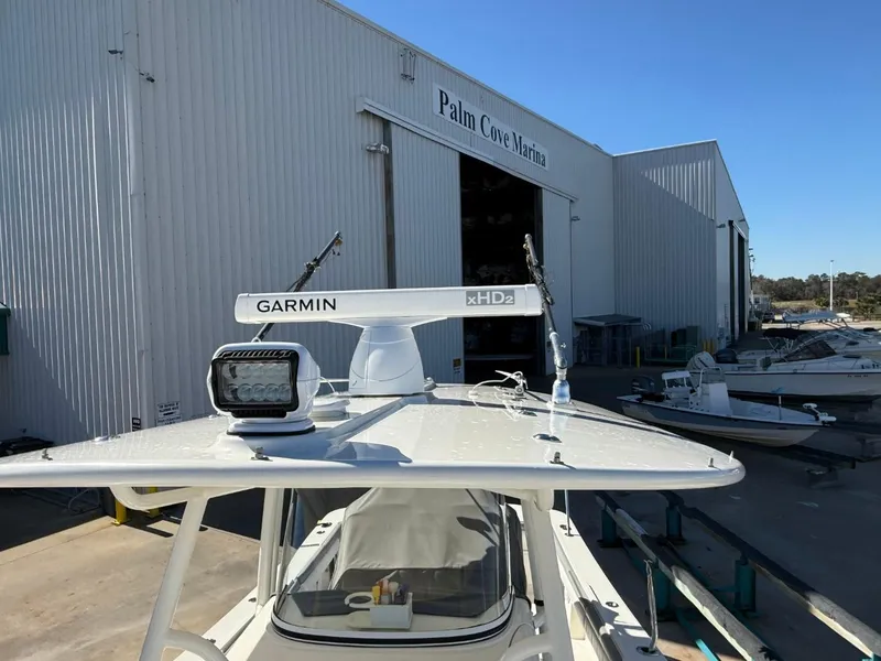 Slide: The Image of 2019 Regulator 31 boat at Palm Cove Marina with Garmin equipment. - 26