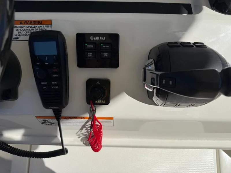 Slide: The Image of Control panel of a 2019 Regulator 31 boat with Yamaha components. - 46