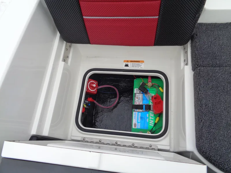 Slide: The Image of Battery compartment of 2025 Ranger 1880 MS Angler boat, featuring secure storage. - 10