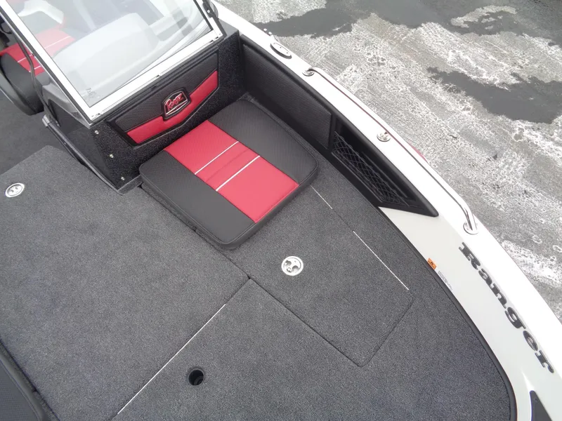 Slide: The Image of 2025 Ranger 1880 MS Angler boat interior with red and black seating and storage compartments. - 20