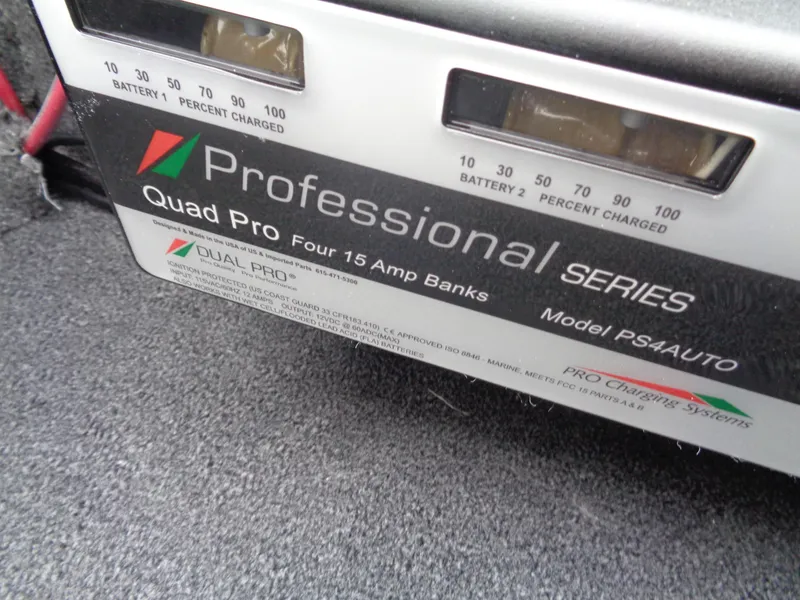 Slide: The Image of Professional Series Quad Pro battery charger in a 2025 Ranger 1880 MS Angler boat. - 23