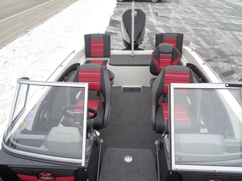 Slide: The Image of 2025 Ranger 1880 MS Angler boat with red and black seating, viewed from above. - 27