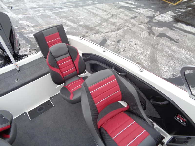 Slide: The Image of 2025 Ranger 1880 MS Angler boat interior with red and black seating. - 30