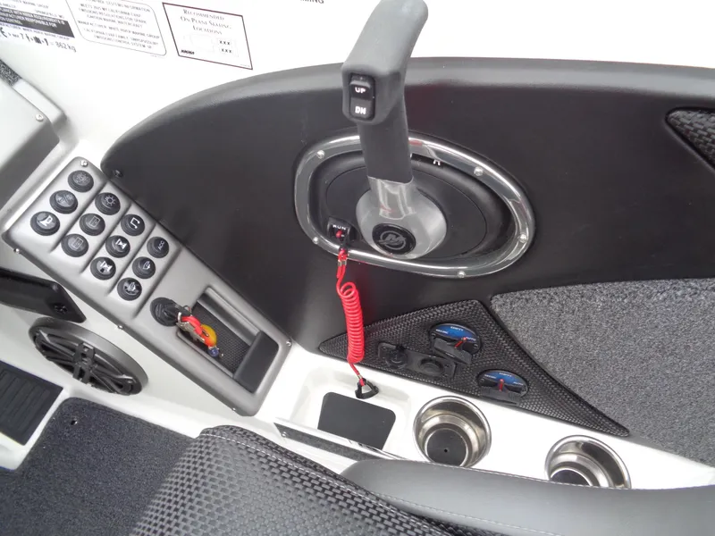 Slide: The Image of Control panel of 2025 Ranger 1880 MS Angler boat with throttle and switches. - 8