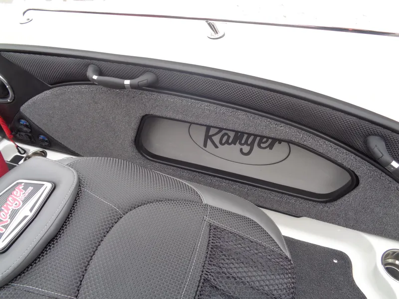 Slide: The Image of Interior of 2025 Ranger 1880 MS Angler boat with branded seating and storage. - 9