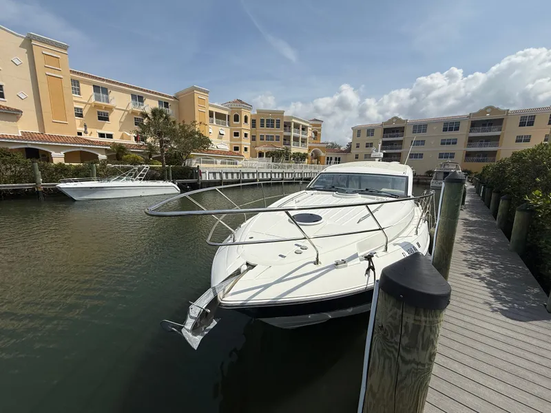 Slide: The Image of 2013 Fairline Targa 38 Open yacht docked near waterfront buildings. - 10