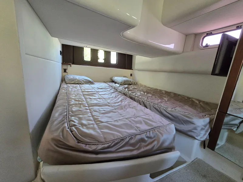 Slide: The Image of 2013 Fairline Targa 38 Open cabin with twin beds, modern interior design. - 28