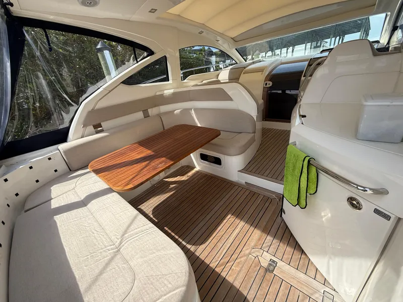 Slide: The Image of 2013 Fairline Targa 38 Open interior with wood flooring and seating area. - 35