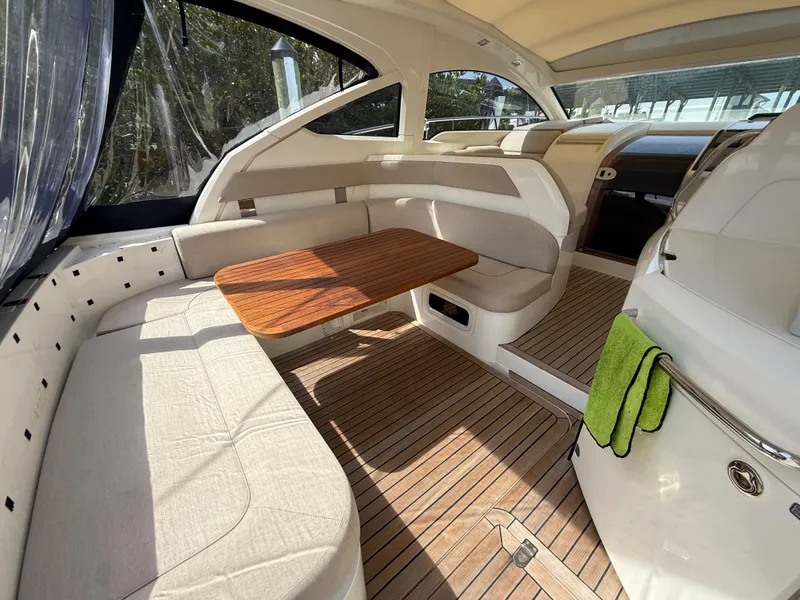Slide: The Image of Interior of 2013 Fairline Targa 38 Open yacht with wooden flooring and seating area. - 36