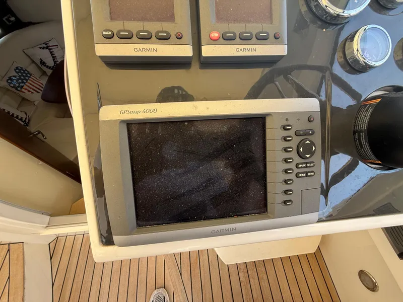 Slide: The Image of Garmin GPS and controls on 2013 Fairline Targa 38 Open yacht dashboard. - 44