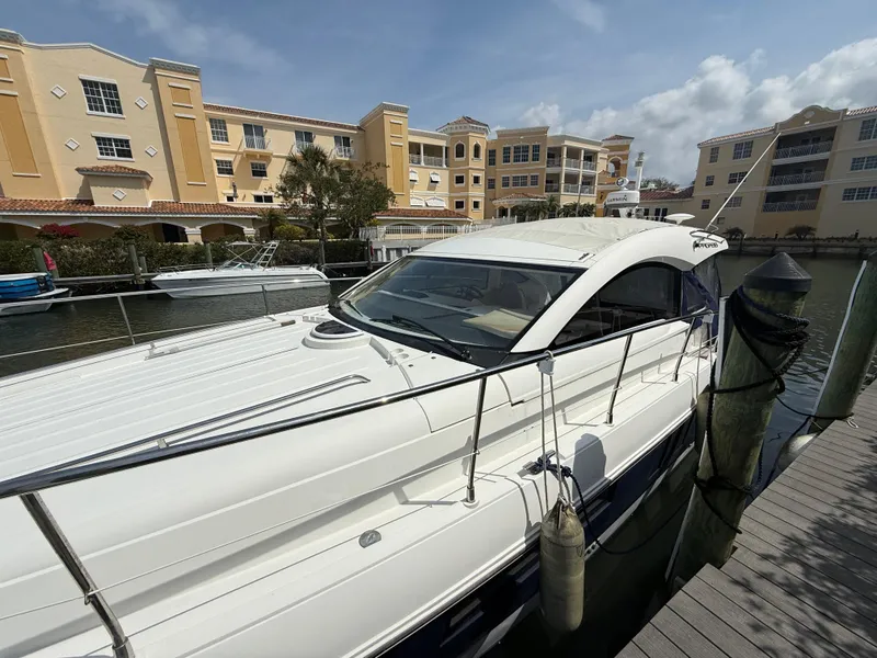 Slide: The Image of 2013 Fairline Targa 38 Open yacht docked near waterfront buildings. - 9