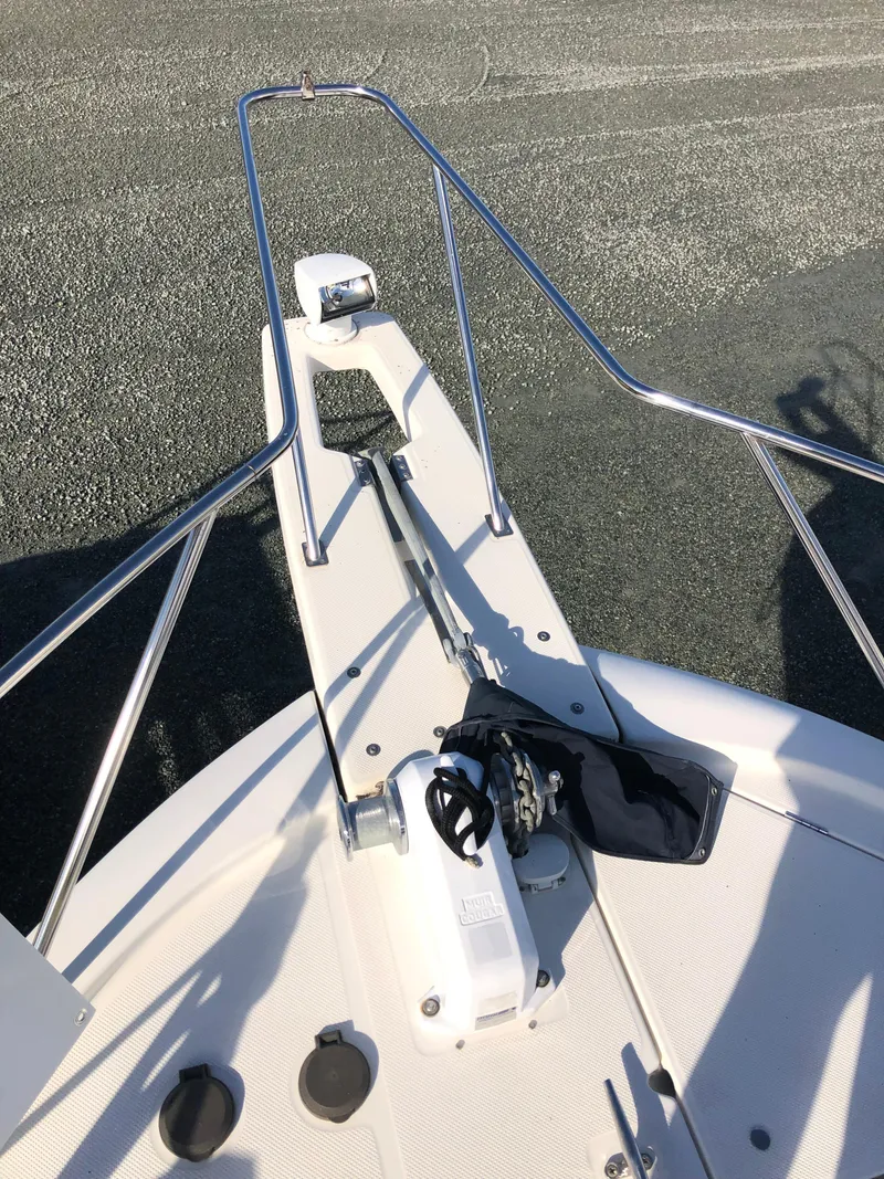 Slide: The Image of 2002 Bayliner 39 Motor Yacht bow with anchor and railing. - 44