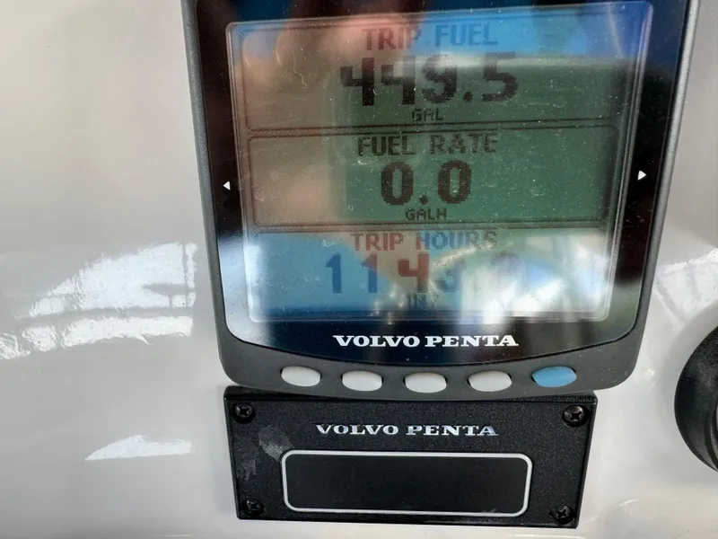 Slide: The Image of Volvo Penta display showing trip fuel, fuel rate, and trip hours on a 2006 Silverton 43 Sport Bridge. - 46
