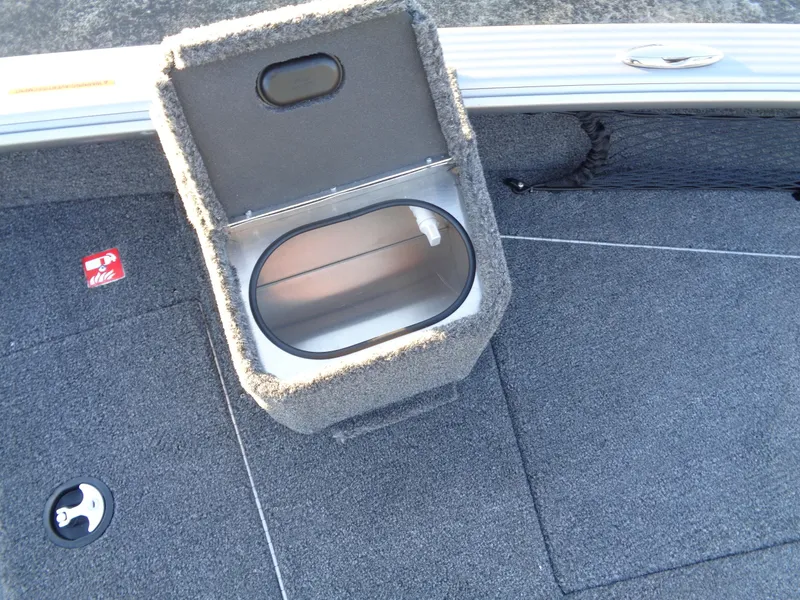 Slide: The Image of 2025 Lund 1875 Pro Guide boat interior with open storage compartment. - 19