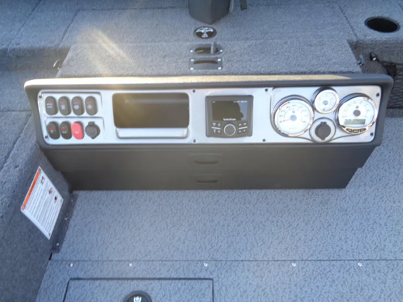 Slide: The Image of Dashboard of 2025 Lund 1875 Pro Guide boat with gauges and controls. - 23