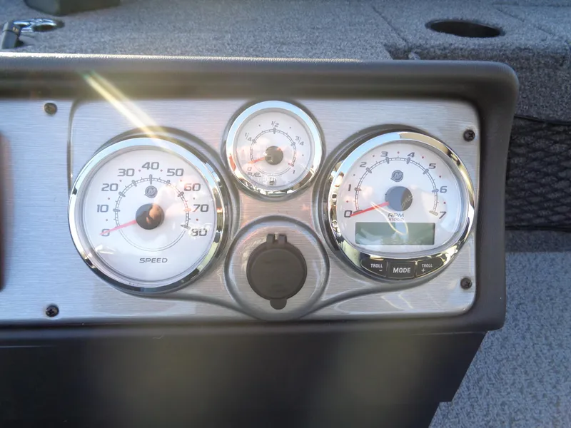 Slide: The Image of Dashboard of 2025 Lund 1875 Pro Guide boat with speedometer and gauges. - 24