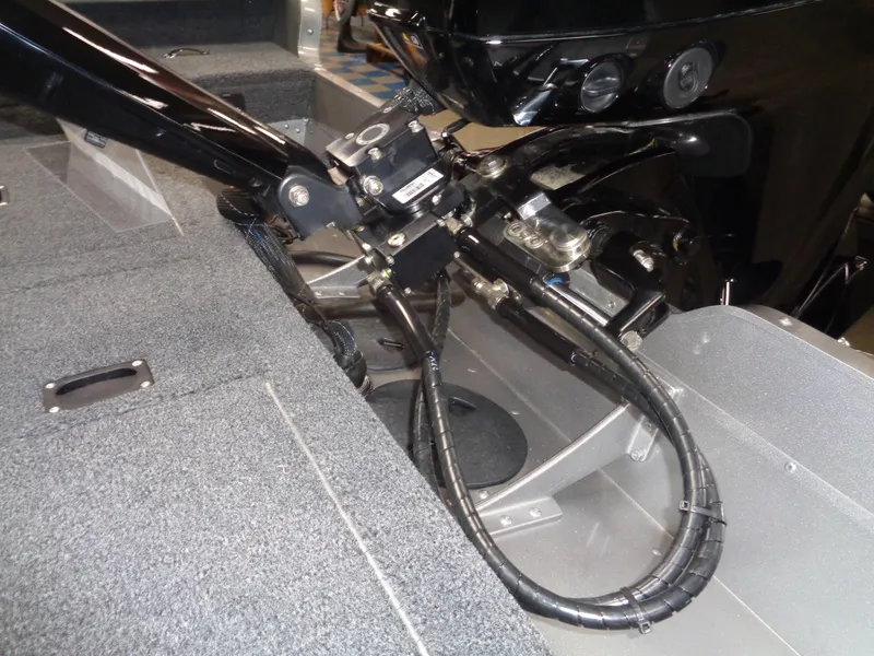 Slide: The Image of 2025 Lund 1875 Pro Guide boat engine components and wiring detail. - 35