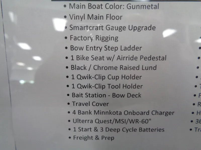 Slide: The Image of 2025 Lund 1875 Pro Guide features list, including gunmetal color, vinyl floor, and Smartcraft gauge upgrade. - 37