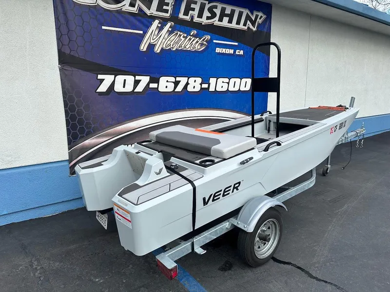 Slide: The Image of 2023 Veer V13 boat on trailer at dealership, featuring sleek design and modern build. - 7