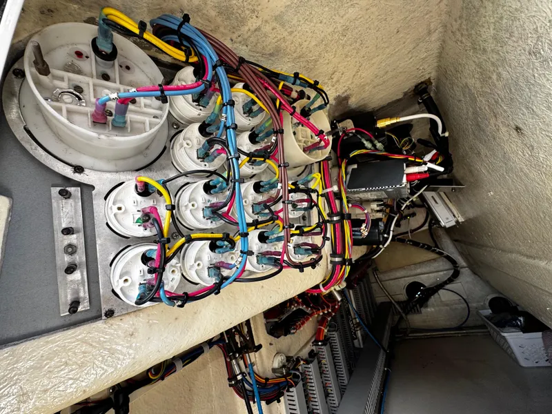 Slide: The Image of Electrical wiring system inside a 1991 Tiara Yachts 3600 Convertible boat. - 14