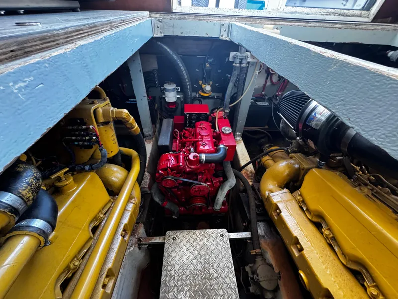 Slide: The Image of Engine room of 1991 Tiara Yachts 3600 Convertible with visible machinery components. - 36