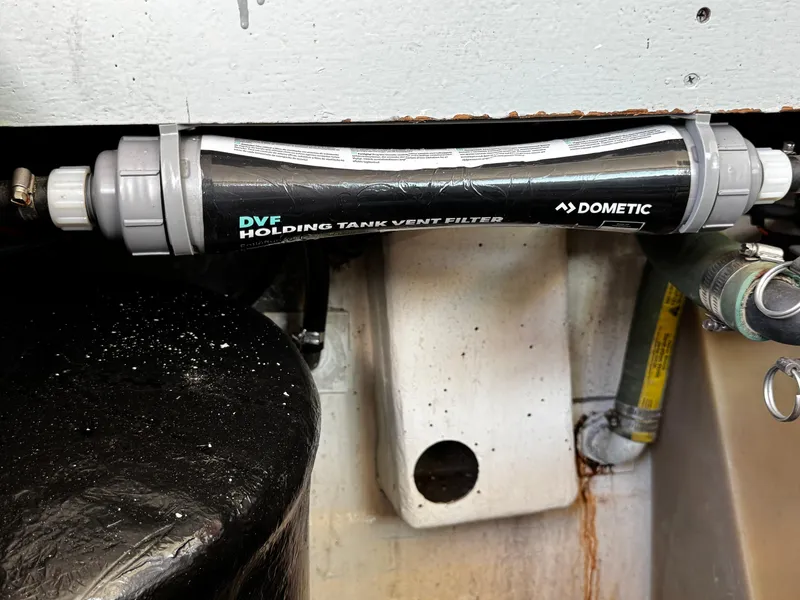 Slide: The Image of Dometic DVF holding tank vent filter in a 1991 Tiara Yachts 3600 Convertible. - 42