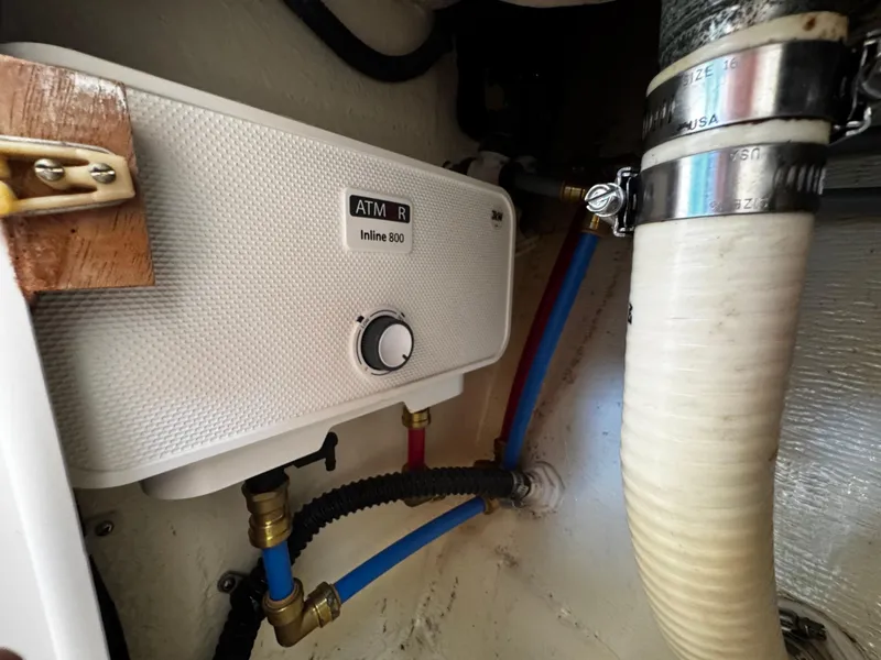 Slide: The Image of 1991 Tiara Yachts 3600 Convertible engine room with ATM Inline 800 component. - 45